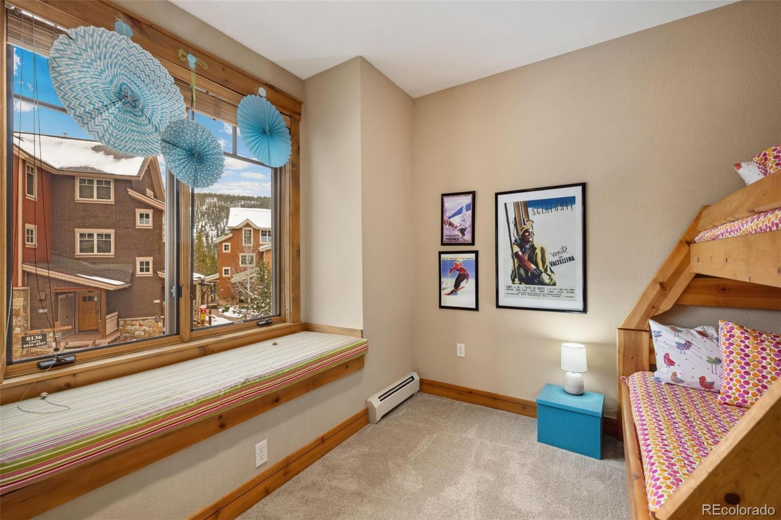 129 Tip Top Trail, Unit 6543 Dillon, CO 80435 - Photo 22 of 40 a view of a hallway with windows