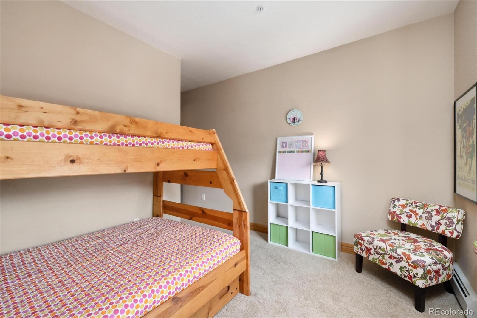 129 Tip Top Trail, Unit 6543 Dillon, CO 80435 - Photo 23 of 40 a bedroom with a bed and a window