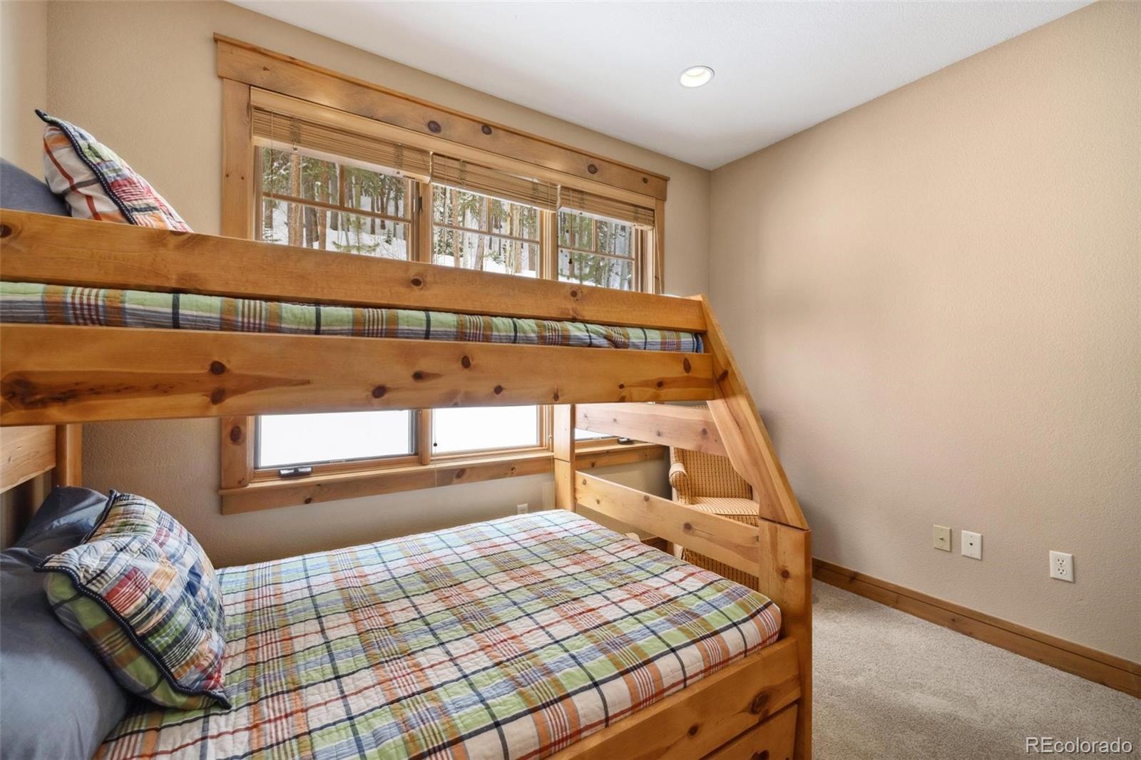 129 Tip Top Trail, Unit 6543 Dillon, CO 80435 - Photo 25 of 40 a room with a bed and a window