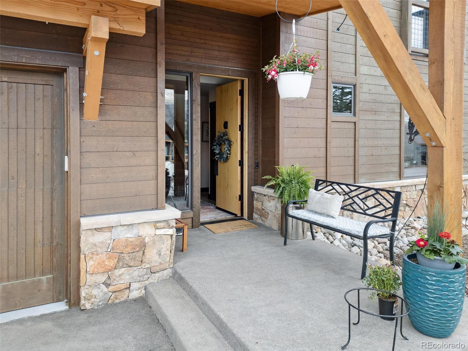 129 Tip Top Trail, Unit 6543 Dillon, CO 80435 - Photo 3 of 40 a view of two chairs in the balcony