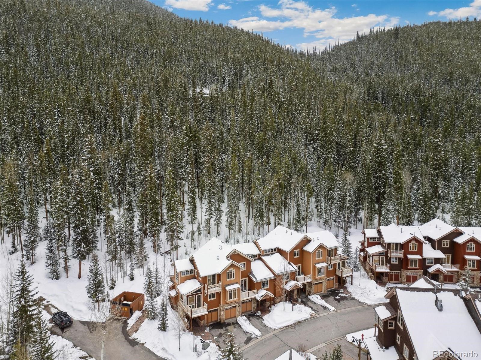 129 Tip Top Trail, Unit 6543 Dillon, CO 80435 - Photo 31 of 40 a view of a lake with sitting space