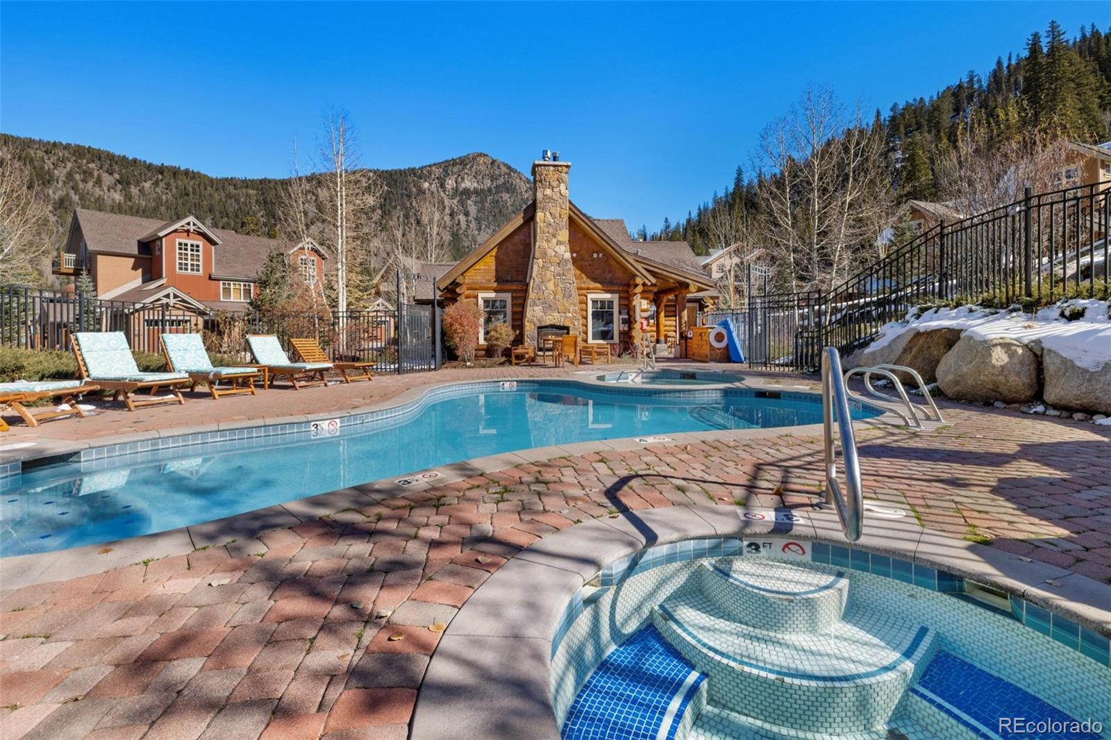 129 Tip Top Trail, Unit 6543 Dillon, CO 80435 - Photo 38 of 40 a front view of a house with garden