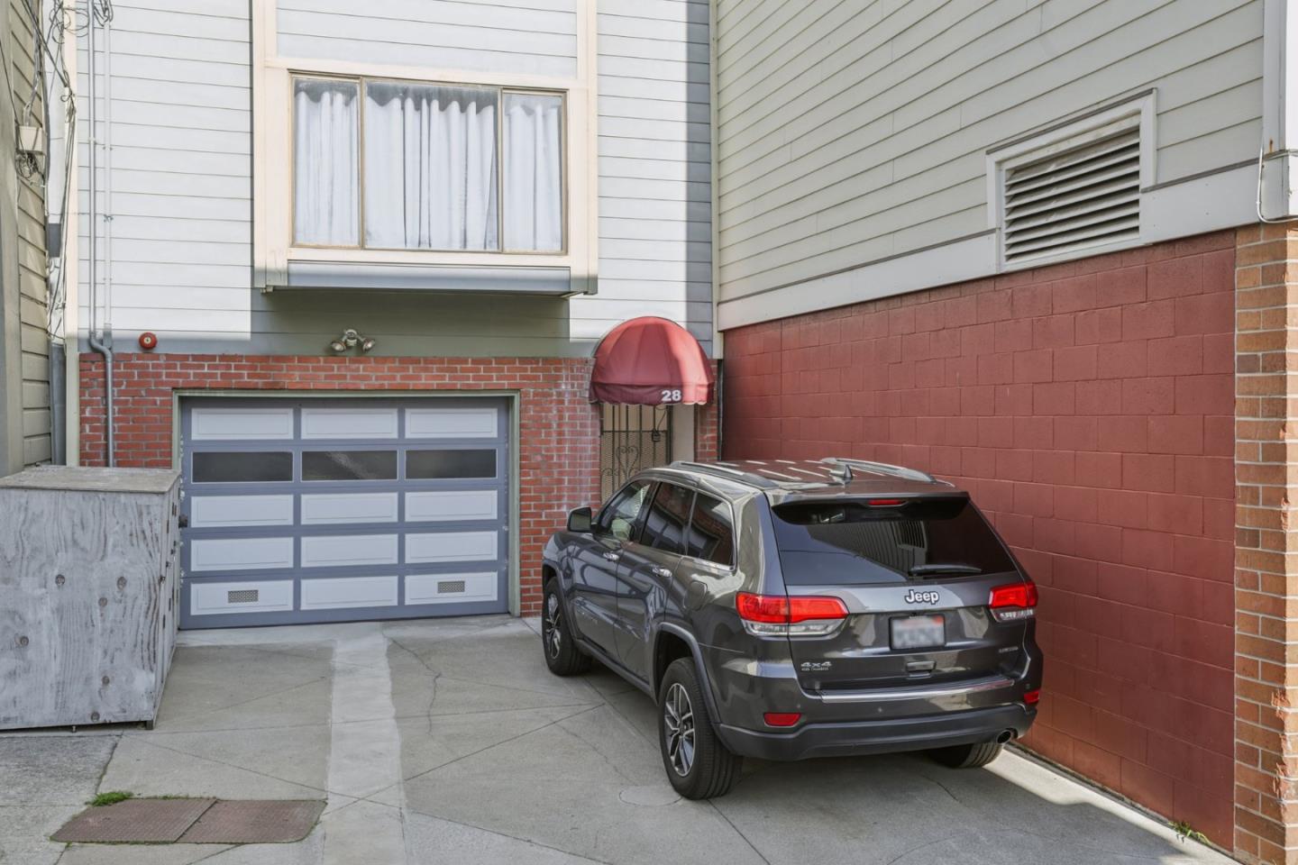 28 Houston Street San Francisco, CA 94133 - Photo 28 of 32 a car parked in front of a house