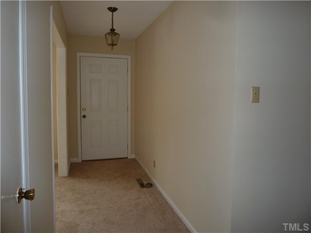201 Barclay Road Durham, NC 27712 - Photo 4 of 25 a view of a hallway with a small space