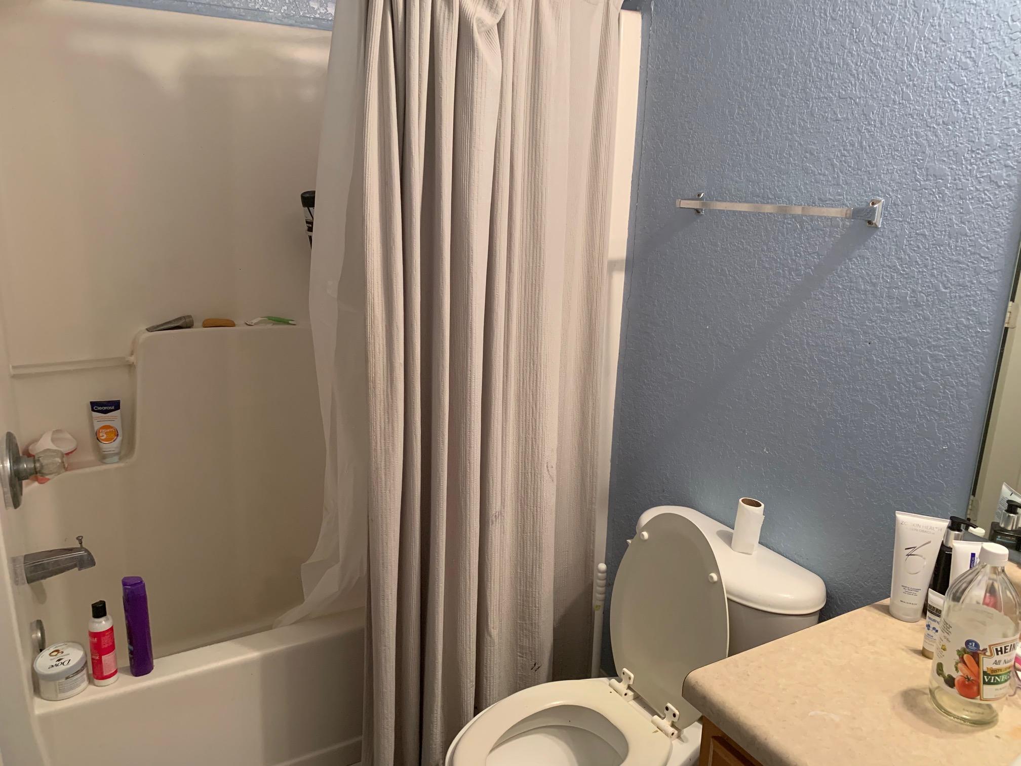 1014 Airport Road, Unit 114 Destin, FL 32541 - Photo 15 of 15 a bathroom with a sink and a mirror