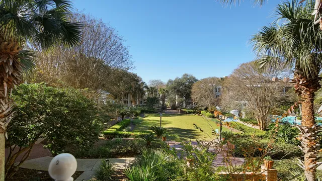 an aerial view of house with yard swimming pool and outdoor seating