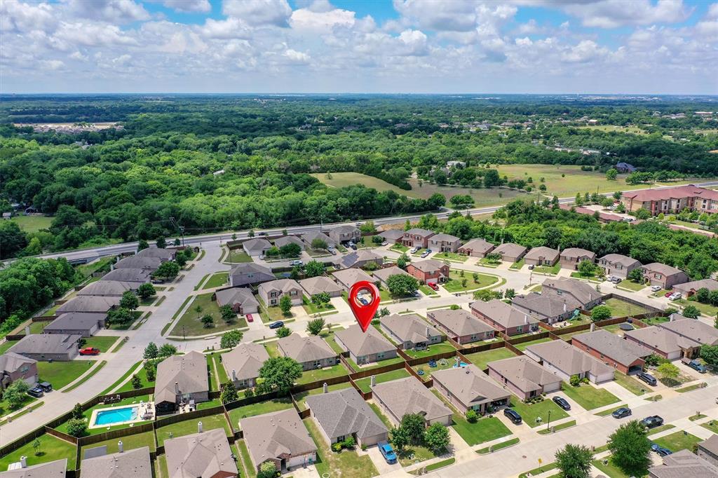 3011 Hickory Ridge Melissa, TX 75454 - Photo 30 of 30 Aerial perspective of a residential neighborhood with a prominent greenbelt backdrop