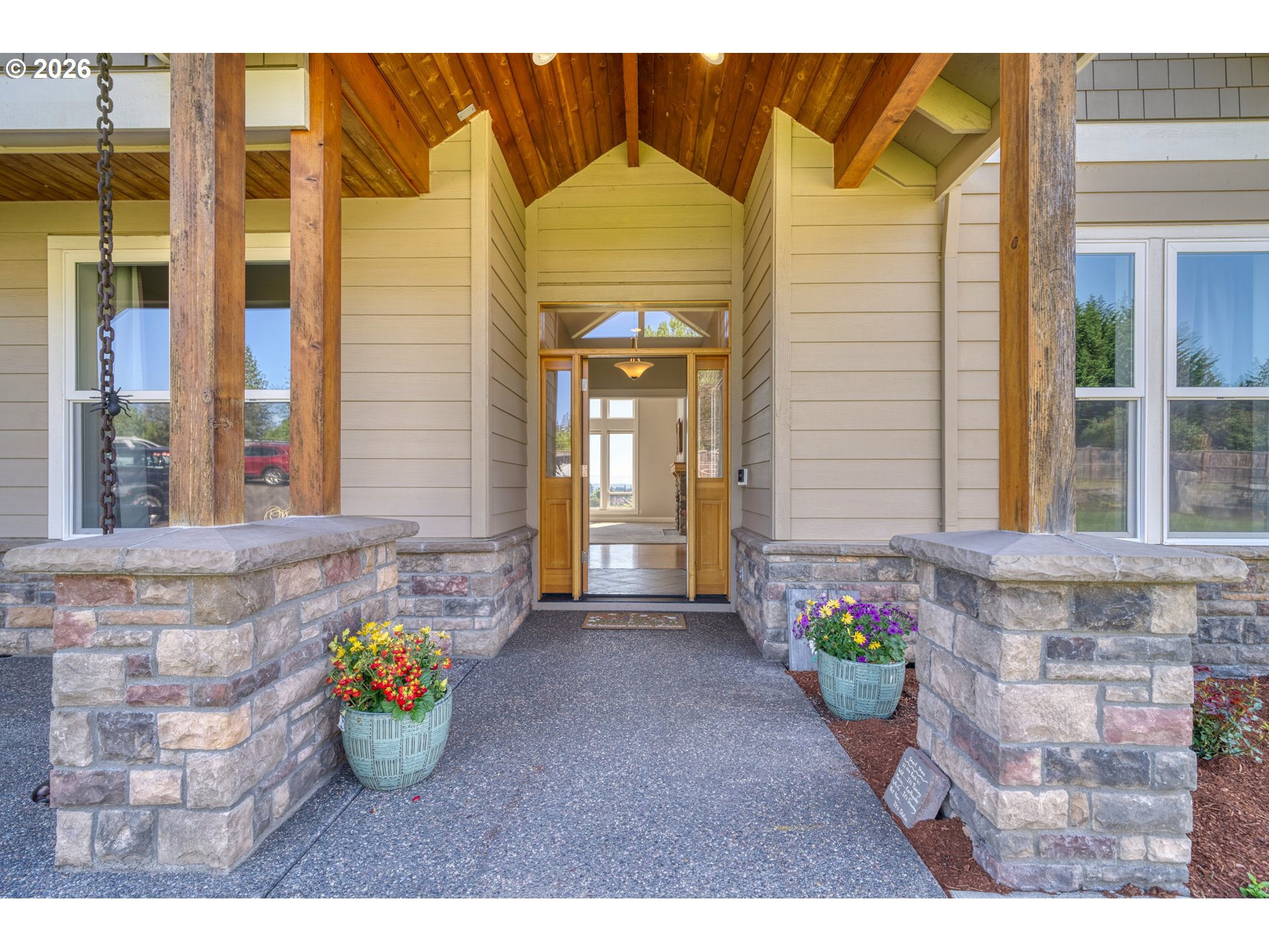 33058 Church Road Warren, OR 97053 - Photo 6 of 45 a front view of a house with an outdoor seating