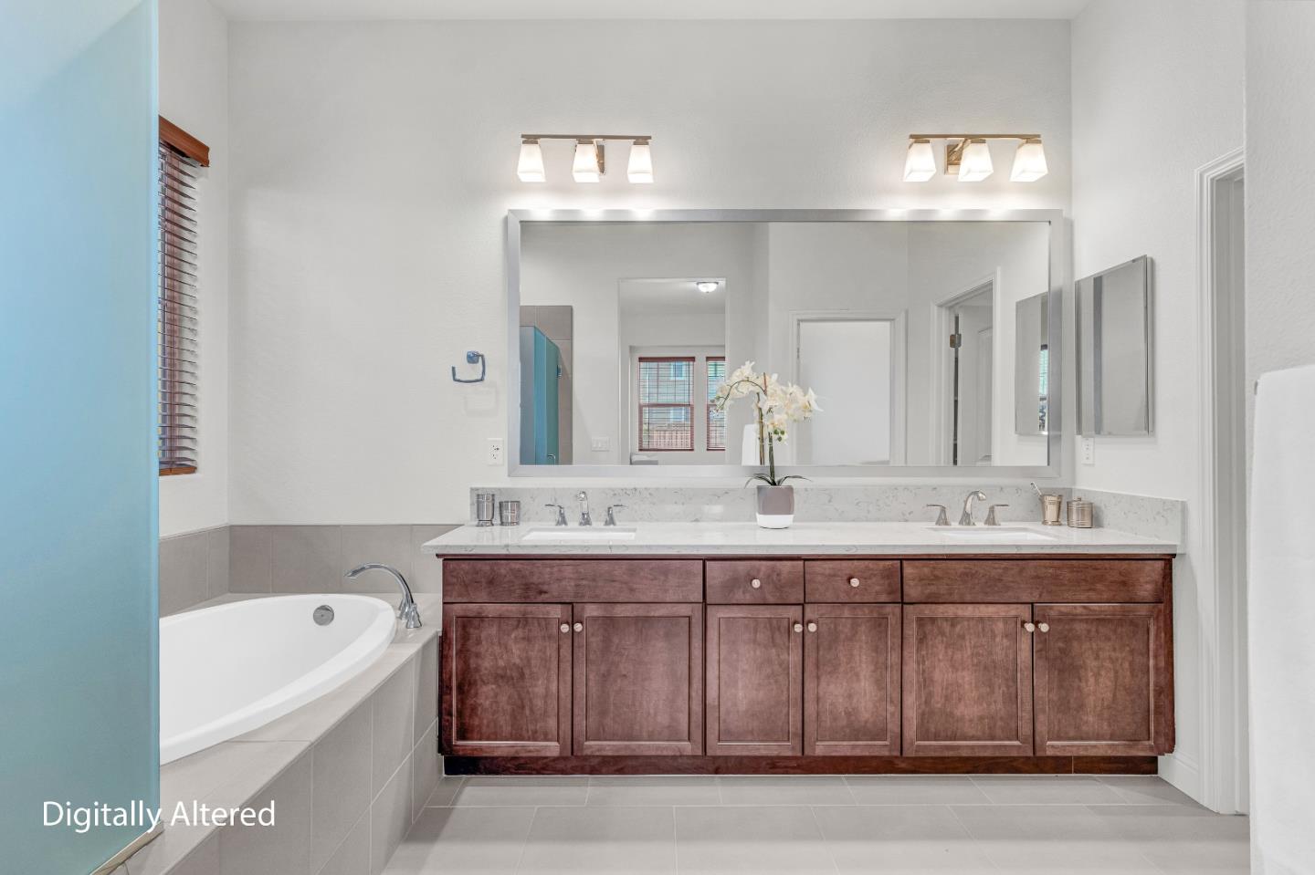 482 Lassen Way Marina, CA 93933 - Photo 19 of 45 a bathroom with a granite countertop double vanity sink and mirror with bathtub