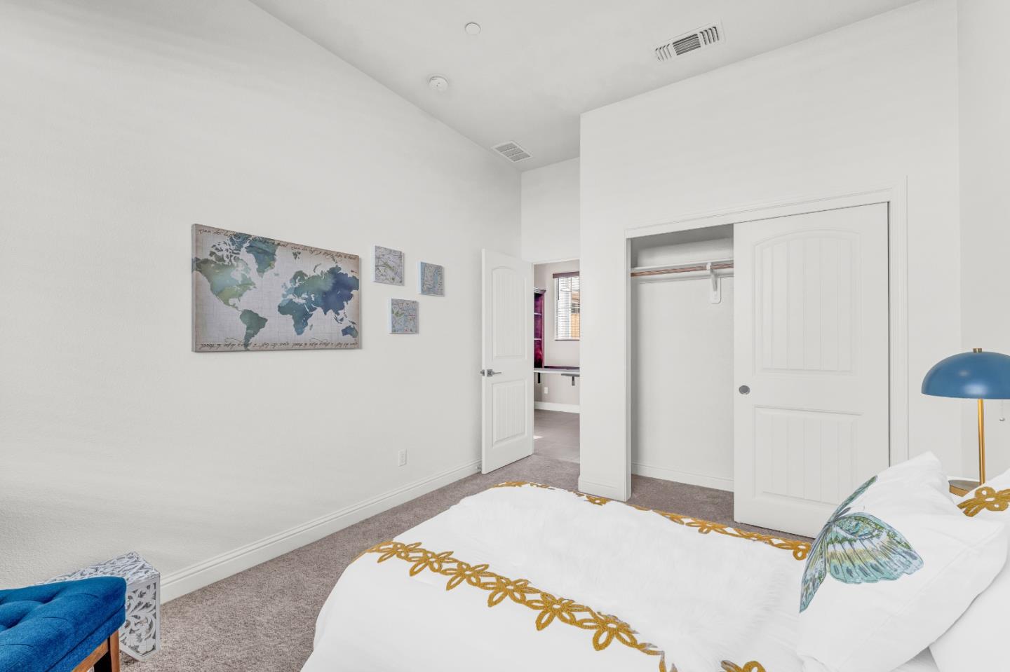 482 Lassen Way Marina, CA 93933 - Photo 27 of 45 a bedroom with a bed and a painting on the wall