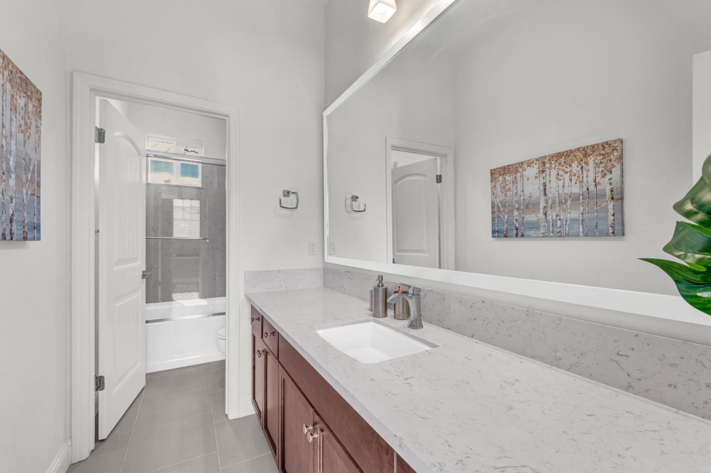 482 Lassen Way Marina, CA 93933 - Photo 30 of 45 a bathroom with a granite countertop sink a bathtub and a shower