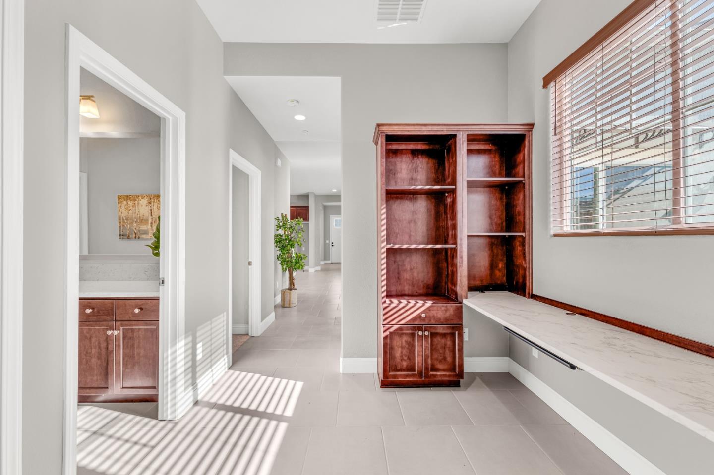482 Lassen Way Marina, CA 93933 - Photo 34 of 45 a hallway with a couch and a large window