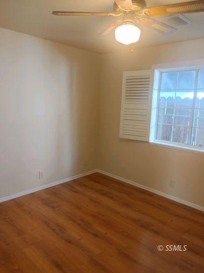 609 East Wilson Avenue Ridgecrest, CA 93555 - Photo 19 of 32 an empty room with a window