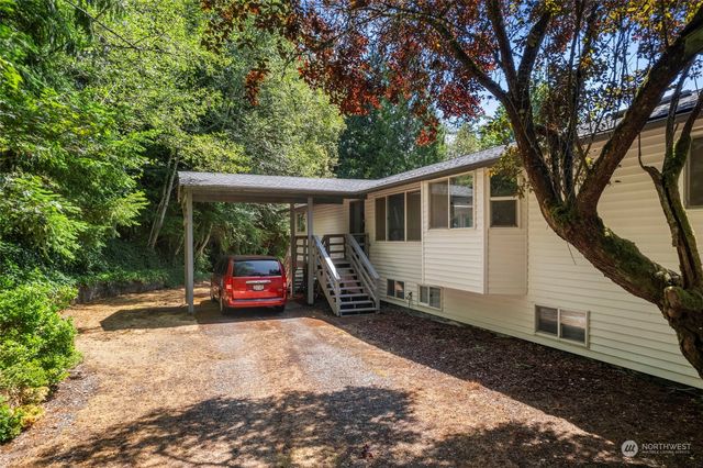 a view of car parked in front of house