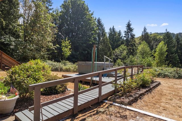 a view of balcony with furniture