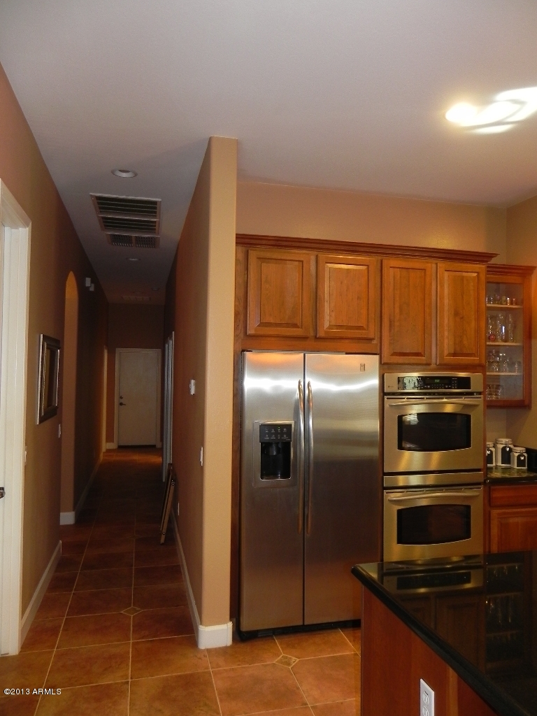 3041 East Weather Vane Road Gilbert, AZ 85296 - Photo 8 of 42 Split Bedrooms Hallway to 3rd Garage