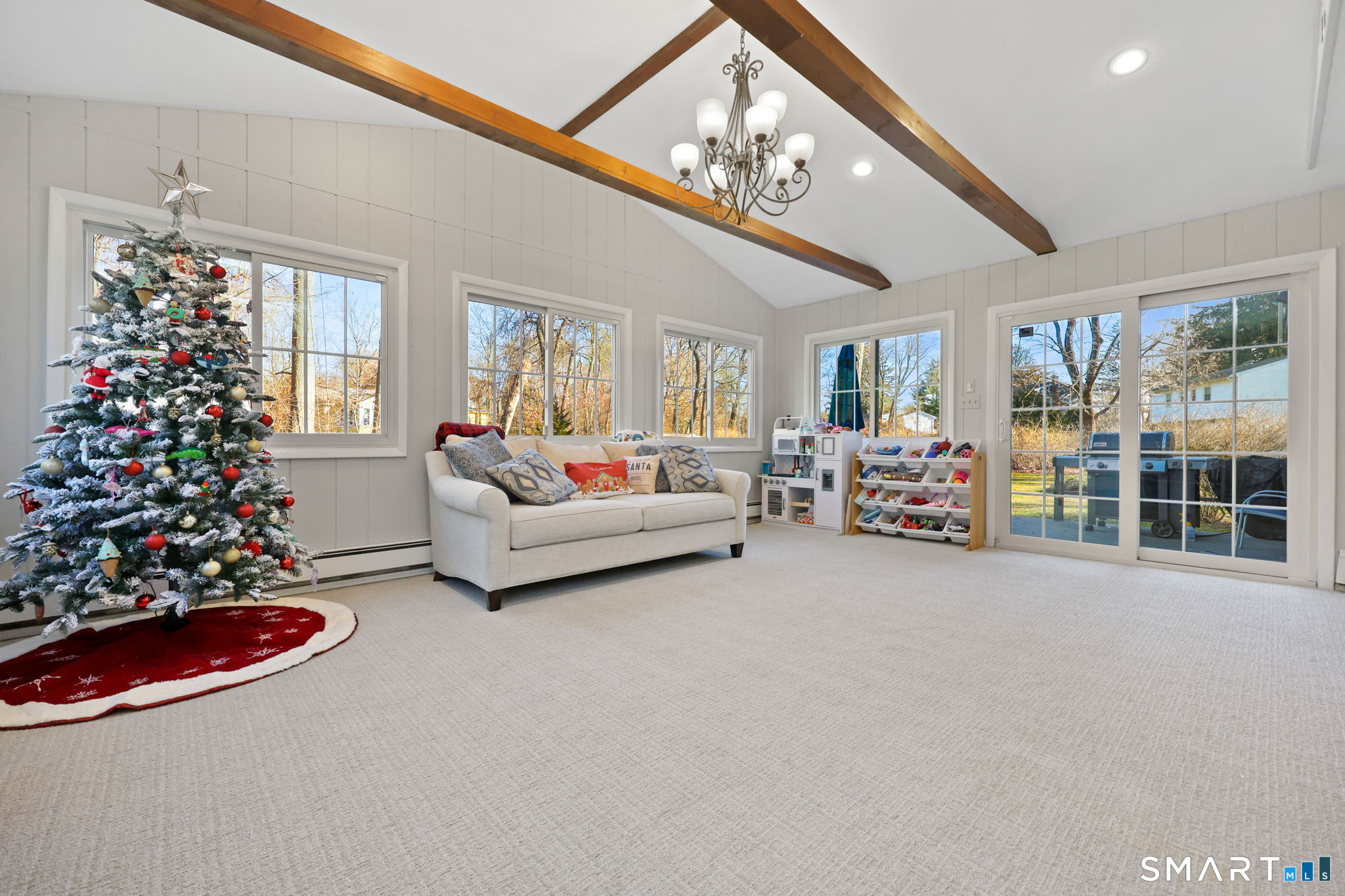 33 Purdy Road East Norwalk, CT 06850 - Photo 13 of 39 a living room with furniture and a large window