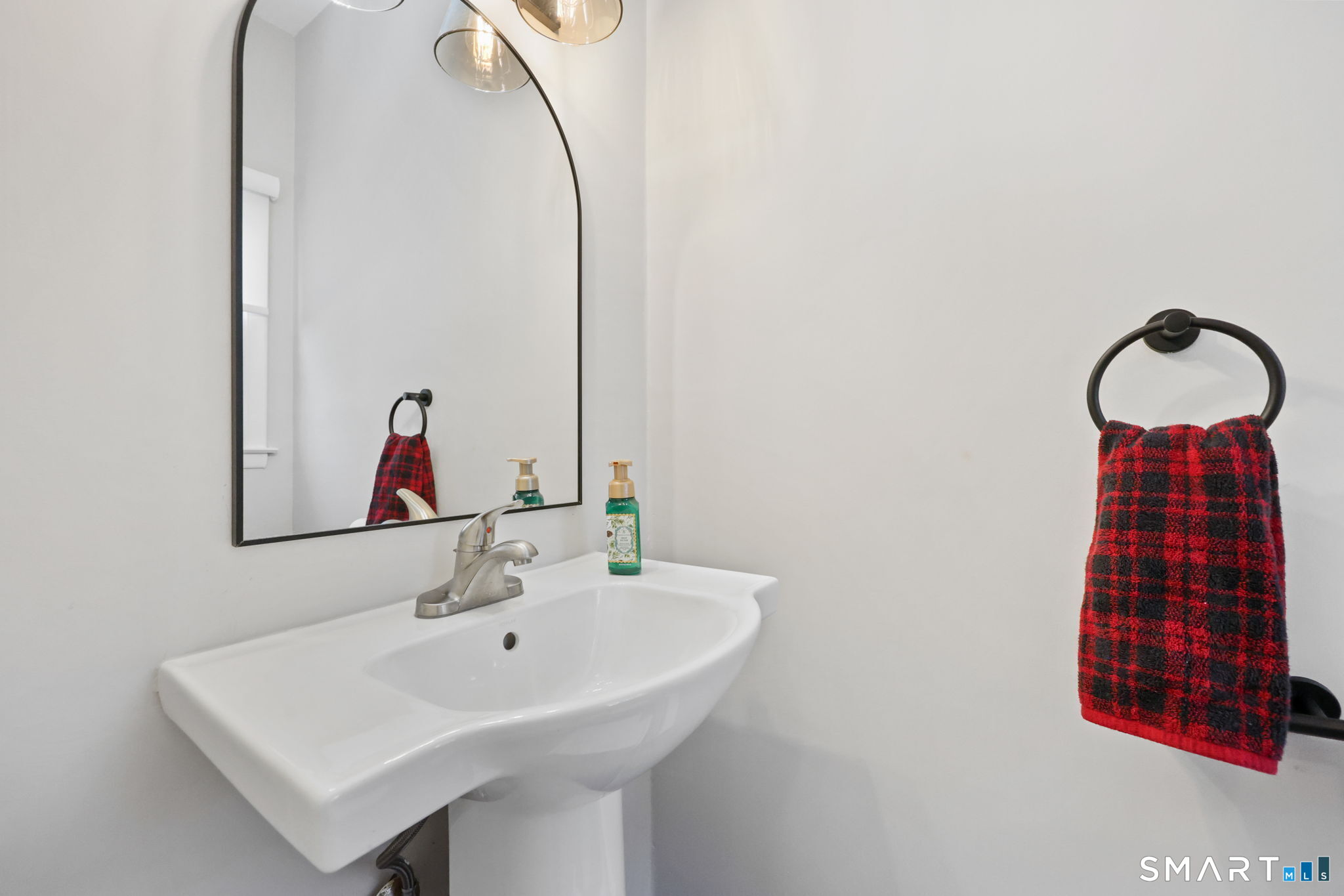 33 Purdy Road East Norwalk, CT 06850 - Photo 18 of 39 a bathroom with a sink and a mirror