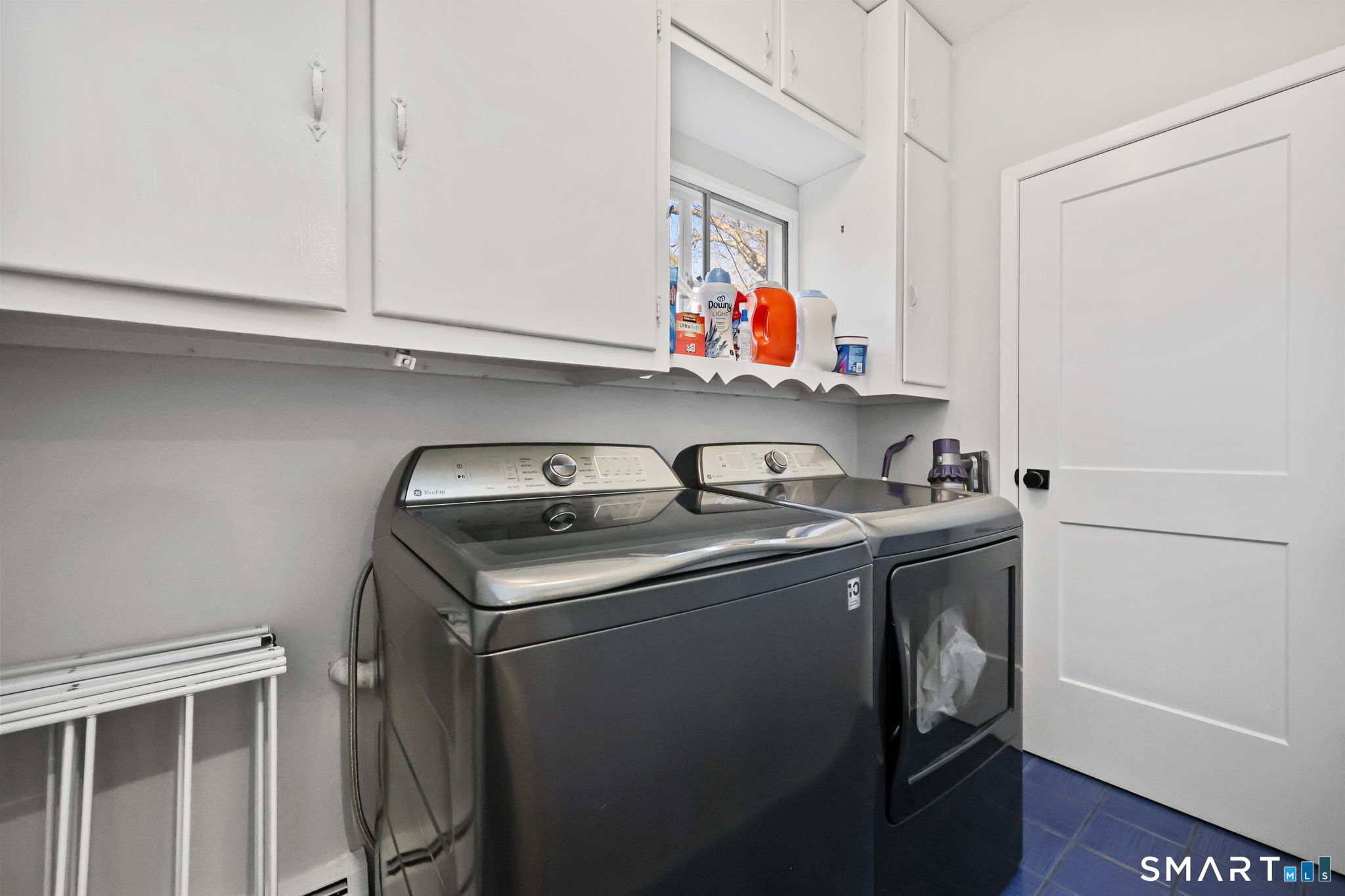 33 Purdy Road East Norwalk, CT 06850 - Photo 19 of 39 a utility room with dryer and washer