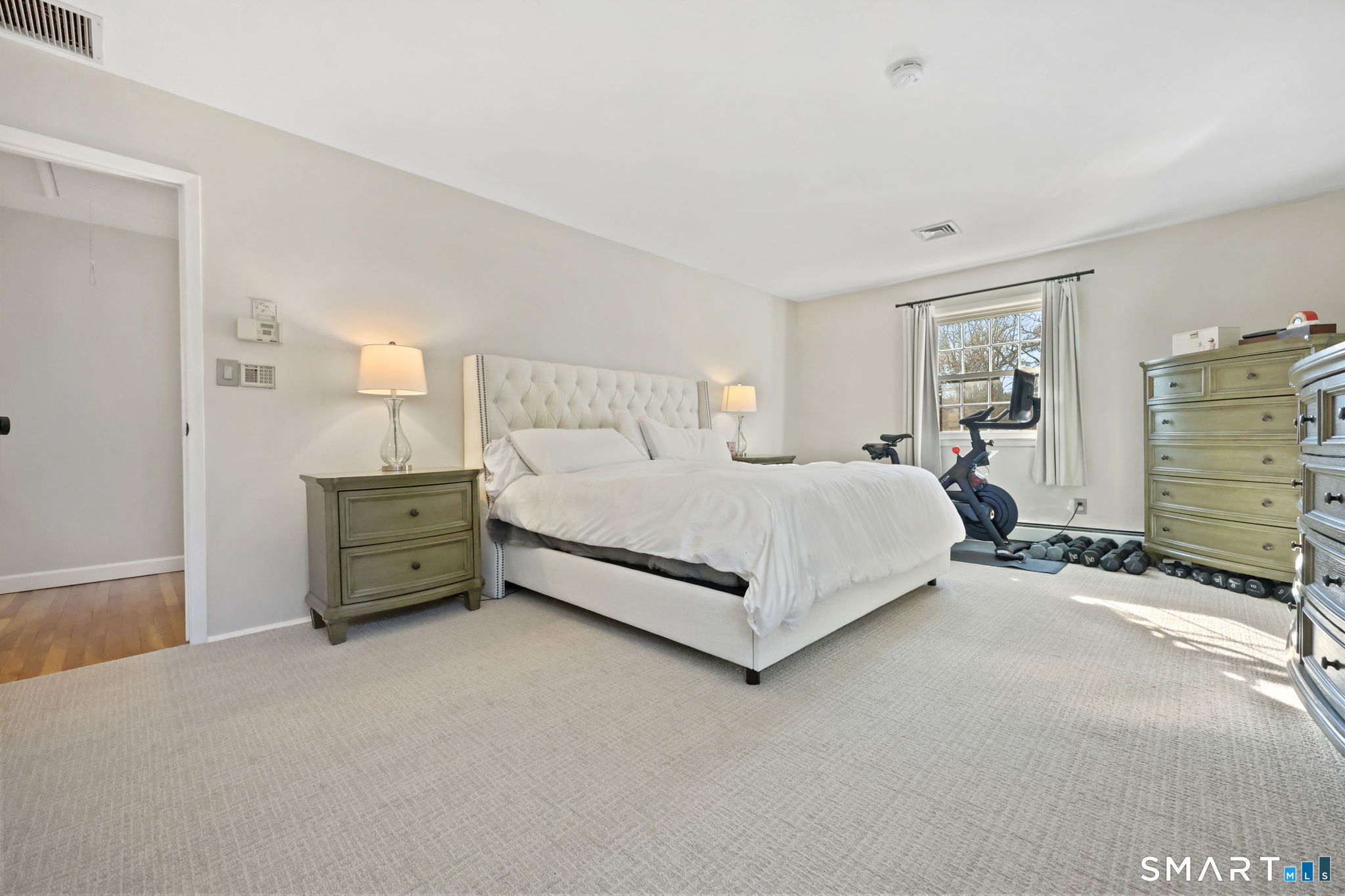 33 Purdy Road East Norwalk, CT 06850 - Photo 20 of 39 a bedroom with a bed and a dresser