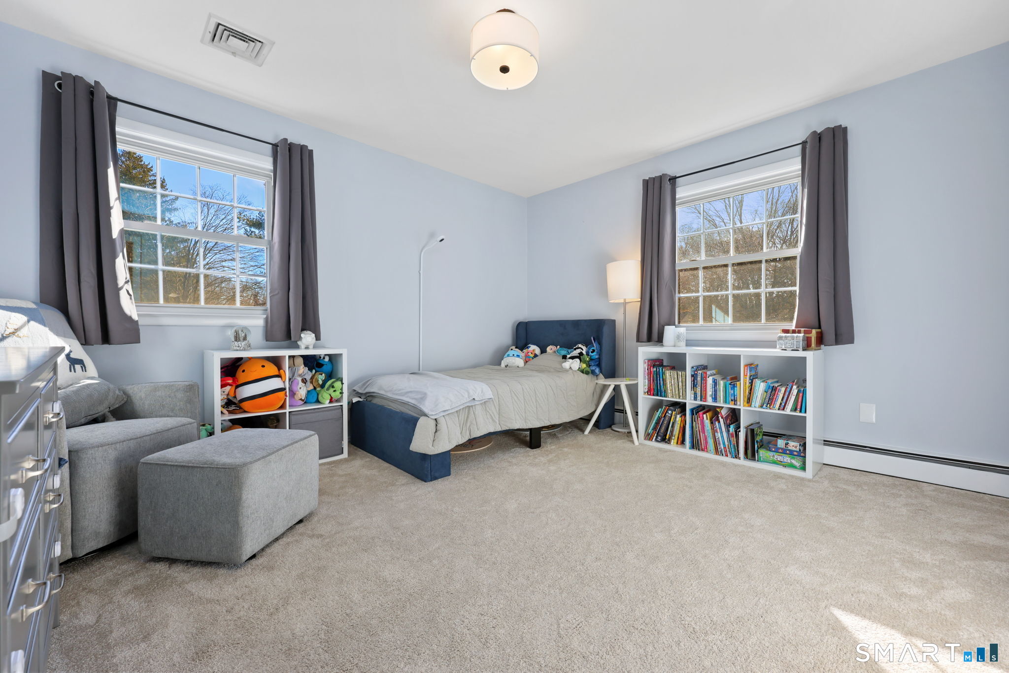 33 Purdy Road East Norwalk, CT 06850 - Photo 27 of 39 a bedroom with furniture and a window