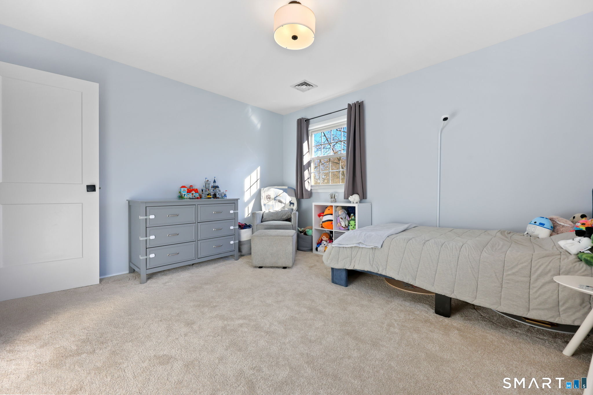 33 Purdy Road East Norwalk, CT 06850 - Photo 28 of 39 a bedroom with bed and window