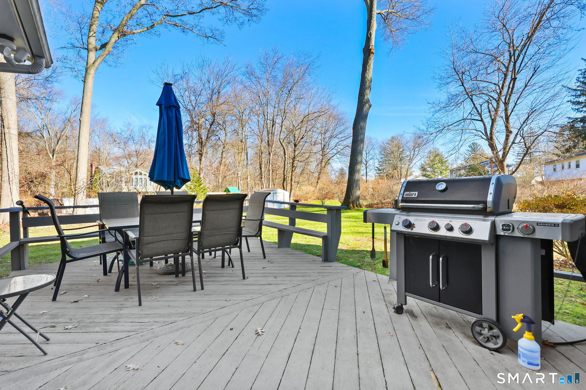 33 Purdy Road East Norwalk, CT 06850 - Photo 31 of 39 a view of a patio with table and chairs and couches with wooden floor