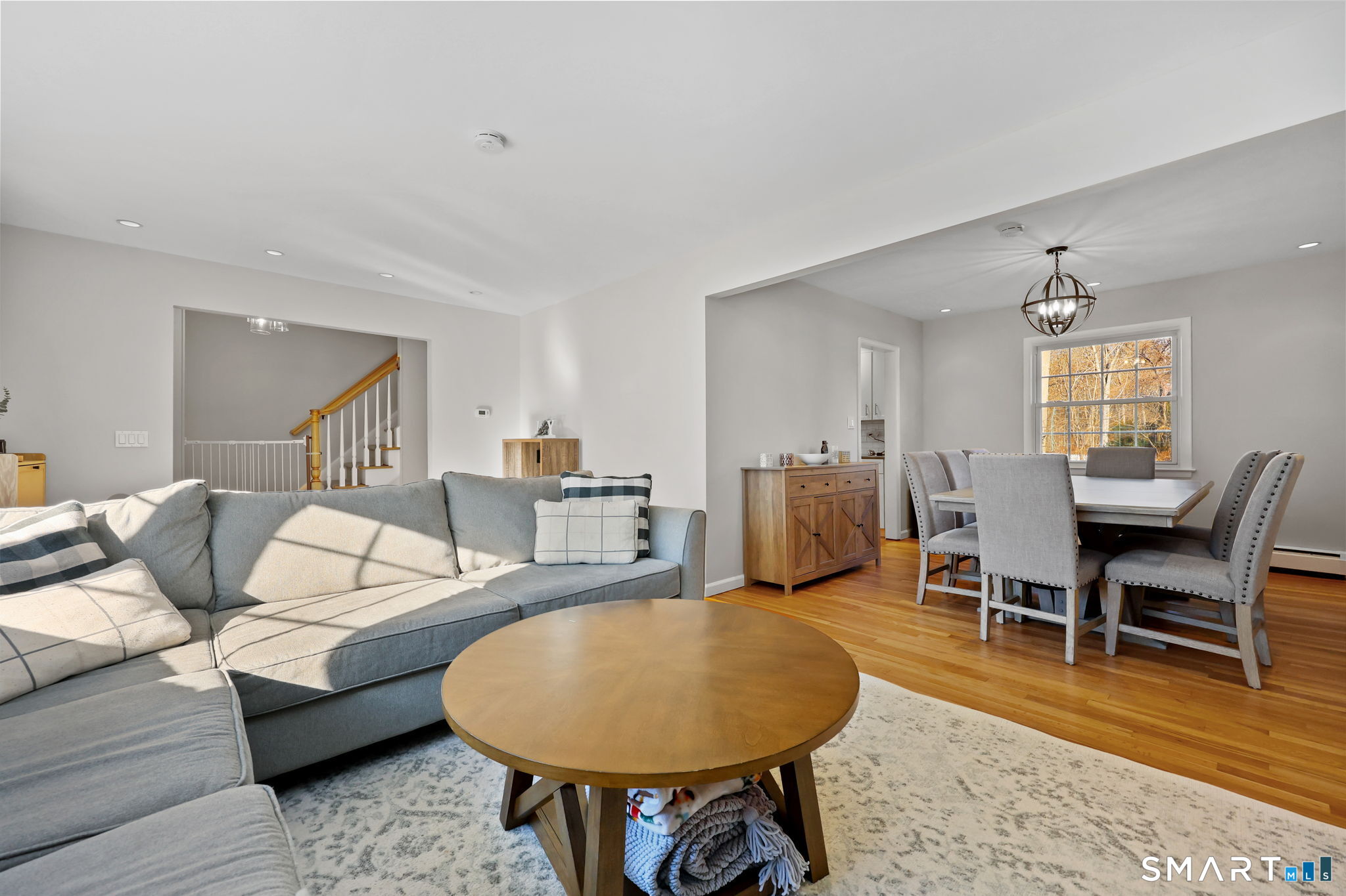 33 Purdy Road East Norwalk, CT 06850 - Photo 5 of 39 a living room with furniture and a table