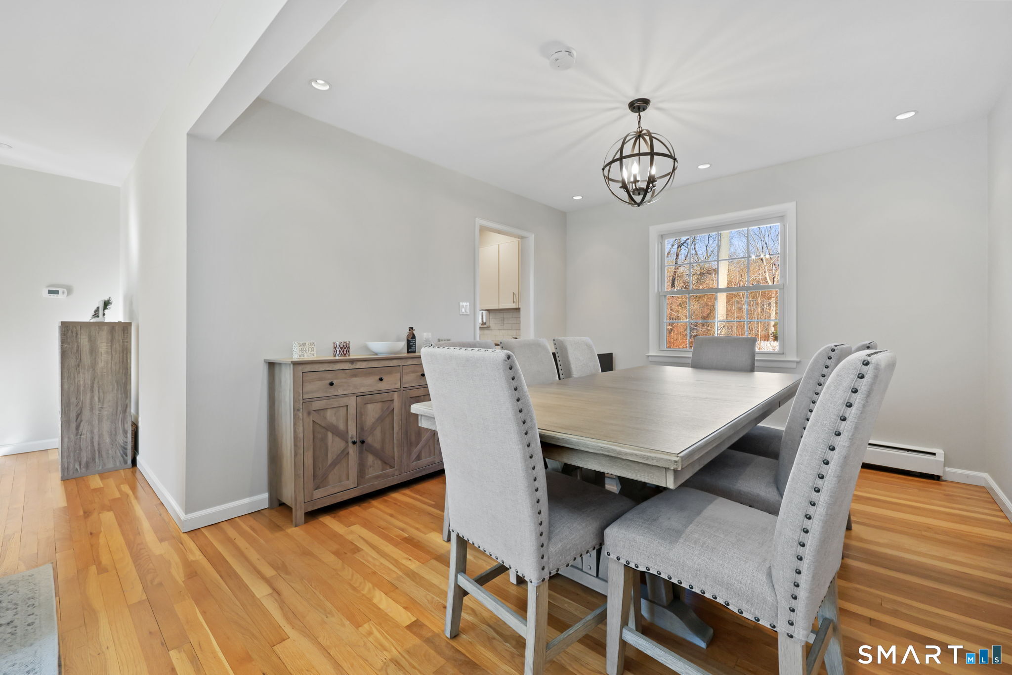 33 Purdy Road East Norwalk, CT 06850 - Photo 6 of 39 a view of a dining room with furniture window and wooden floor