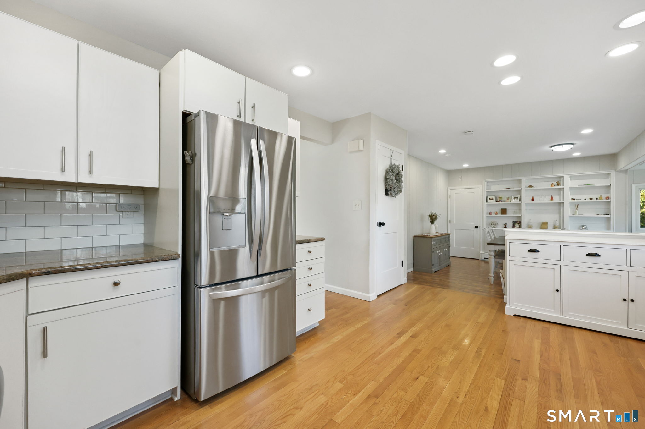 33 Purdy Road East Norwalk, CT 06850 - Photo 10 of 39 a kitchen with stainless steel appliances a refrigerator sink and cabinets