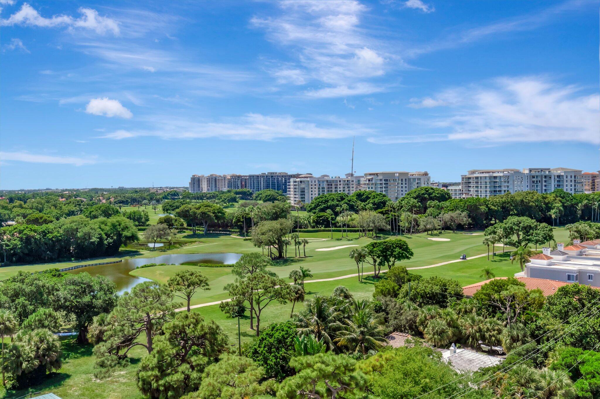 475 East Royal Palm Road, Unit PH 906 Boca Raton, FL 33432 - Photo 29 of 44 a view of a city with lush green forest