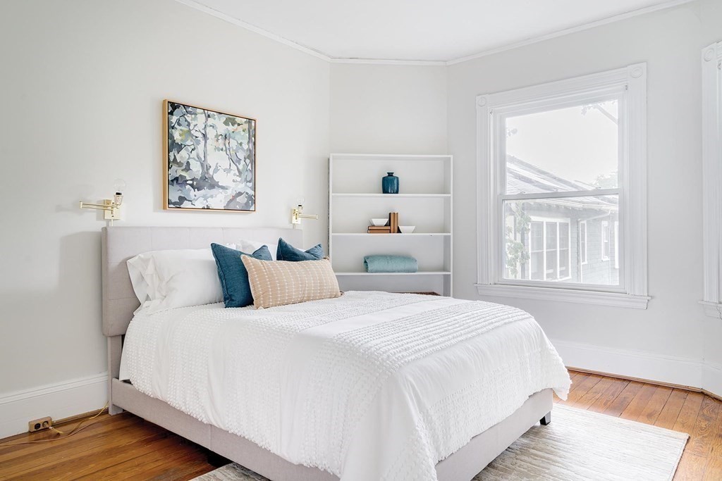 30 Stanton Road, Unit 3 Brookline, MA 02445 - Photo 11 of 13 a bedroom with a bed and a window
