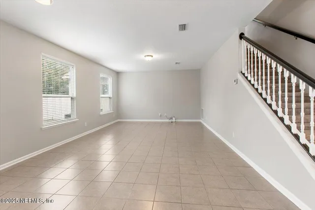 an empty room with windows