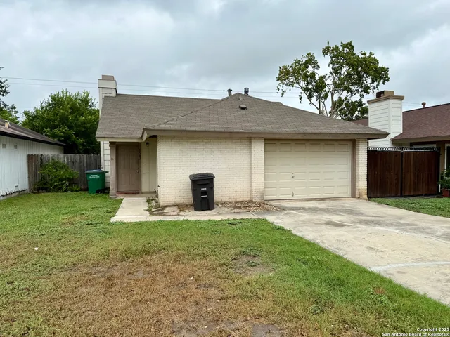 a house view with a garden space