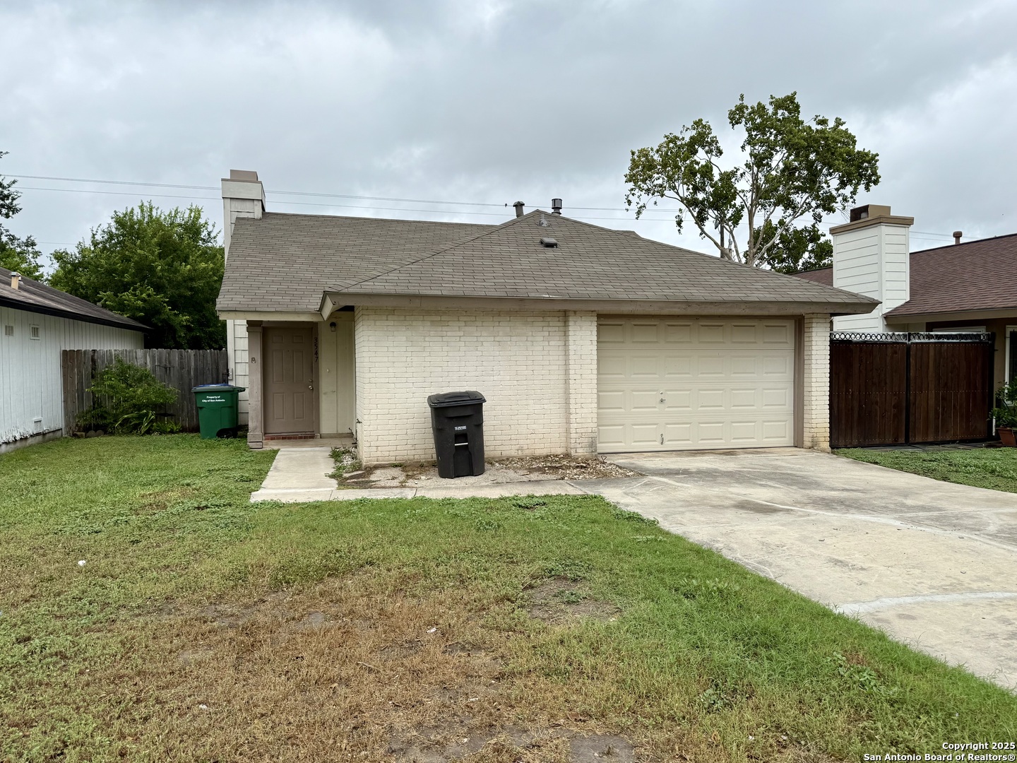 a house view with a garden space
