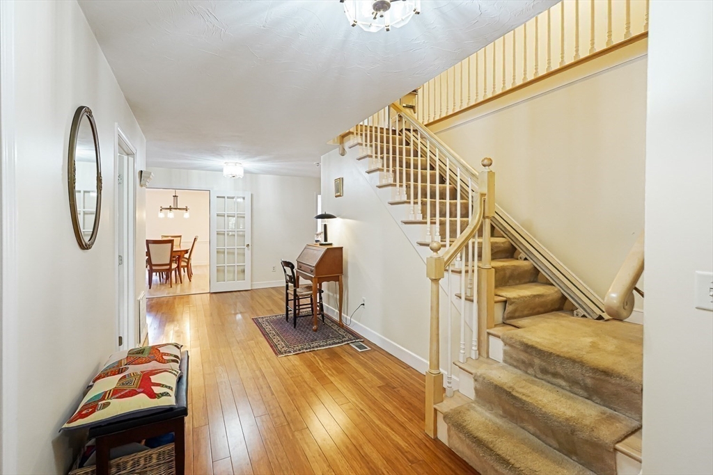 33 Woodstone Road Northborough, MA 01532 - Photo 16 of 42 a view of a livingroom with wooden floor and furniture