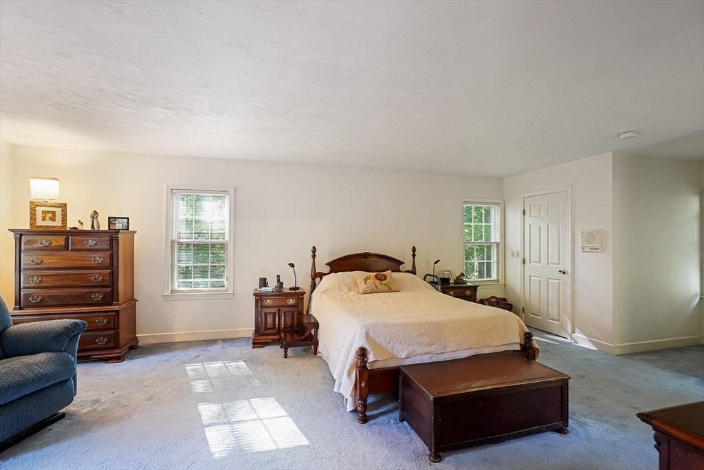 33 Woodstone Road Northborough, MA 01532 - Photo 21 of 42 a bedroom with a bed and a couch