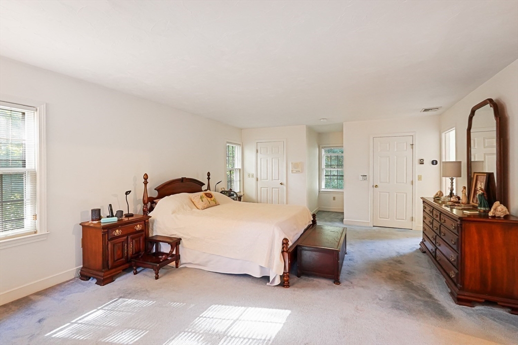 33 Woodstone Road Northborough, MA 01532 - Photo 22 of 42 a bedroom with bed and windows