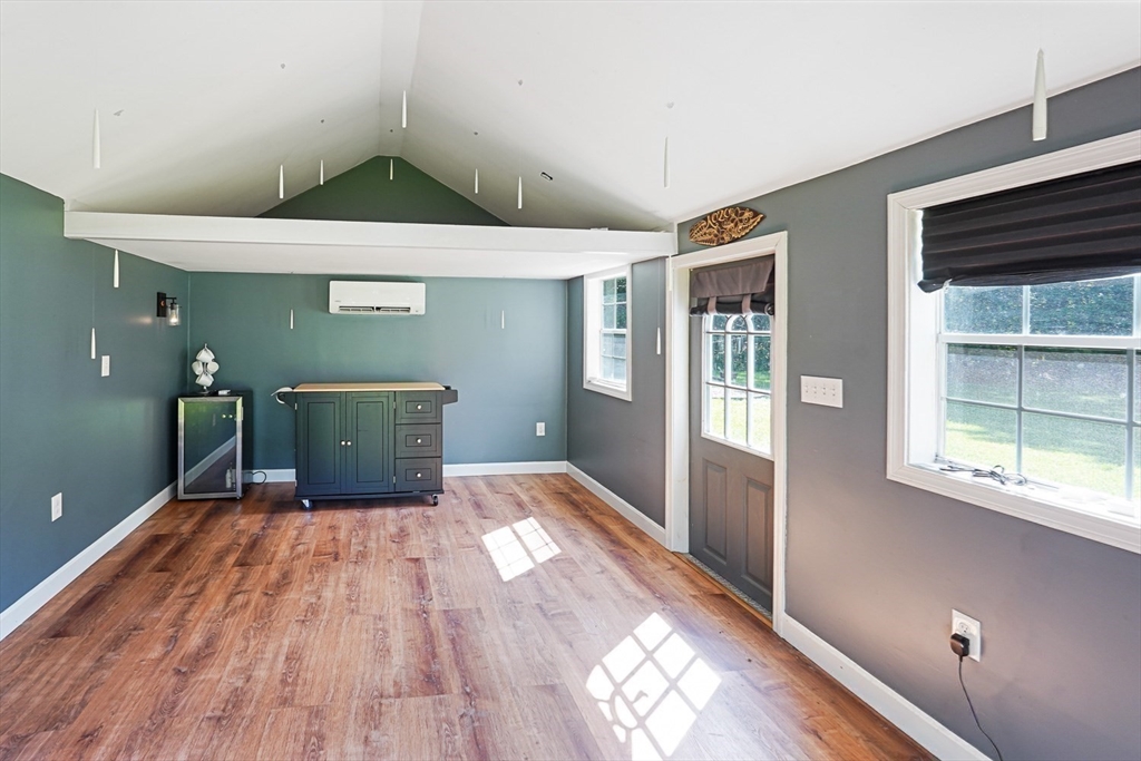 33 Woodstone Road Northborough, MA 01532 - Photo 32 of 42 a view of a room with wooden floor and windows