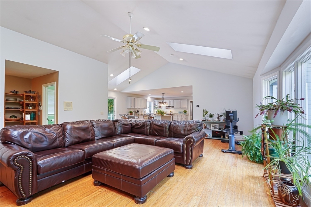 33 Woodstone Road Northborough, MA 01532 - Photo 6 of 42 a living room with furniture flowerpot and a chandelier