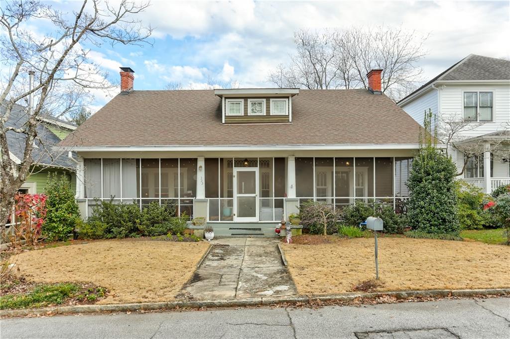 323 Melrose Avenue - 1 mile walk to Decatur Square & Oakhurst Village. Featuring professionally landscaped front yard with irrigation system (off street, alley parking in back to fit 3+ cars)