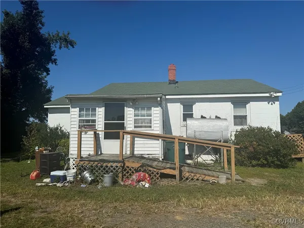 front view of a house with a big yard