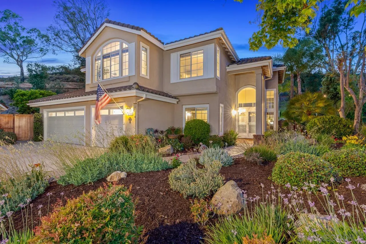 a view of a house with a garden