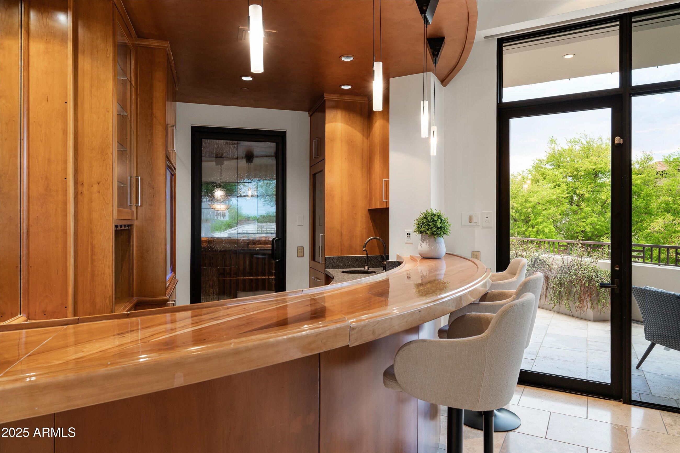 7451 North Las Brisas Lane Paradise Valley, AZ 85253 - Photo 16 of 78 Wet Bar with Walk-In Wine Cellar