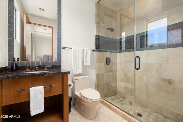 a view of a chairs and table in patio