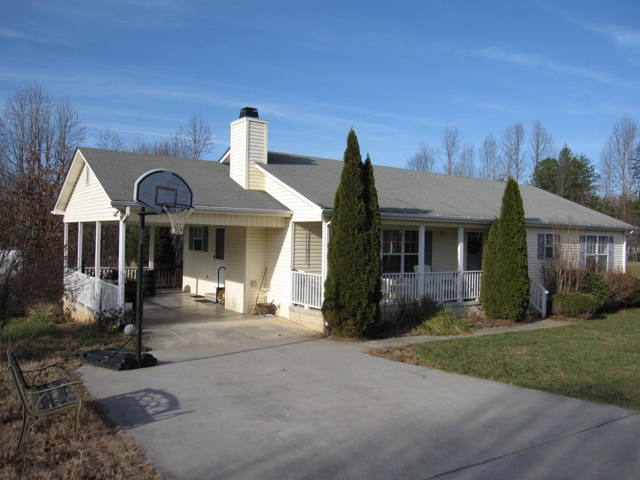 2169 Deep Woods Road Hardy, VA 24101 - Photo 14 of 37 a front view of a house with garden