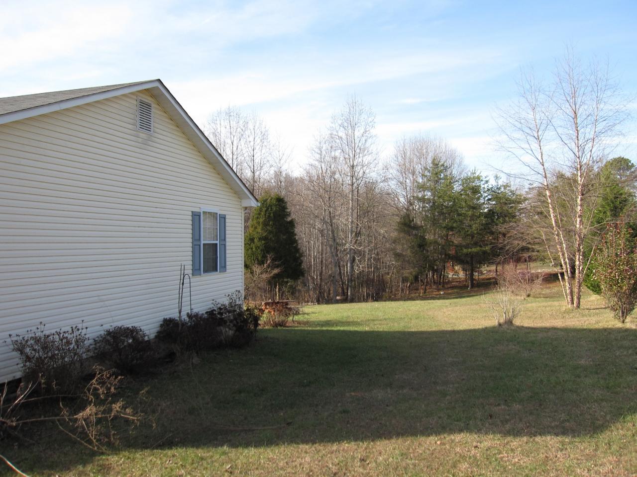 2169 Deep Woods Road Hardy, VA 24101 - Photo 17 of 37 a view of a house with a yard