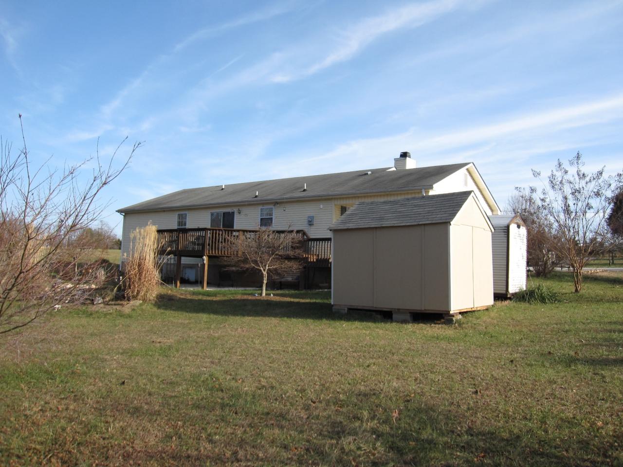 2169 Deep Woods Road Hardy, VA 24101 - Photo 20 of 37 a view of a house with a yard and sitting area