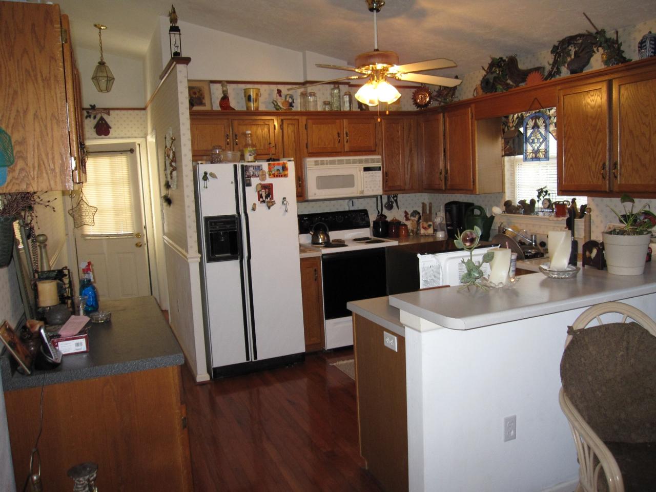 2169 Deep Woods Road Hardy, VA 24101 - Photo 28 of 37 a kitchen with stainless steel appliances a sink stove and refrigerator