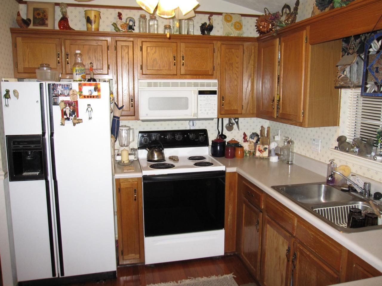 2169 Deep Woods Road Hardy, VA 24101 - Photo 29 of 37 a kitchen with stainless steel appliances granite countertop a sink stove and refrigerator